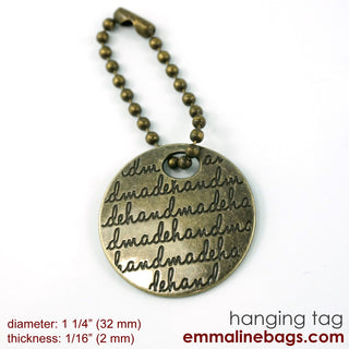 Metal Hanging Tag: Small Circle "handmade" in Antique Brass - Emmaline Bags Inc.