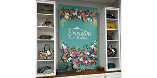 Emmaline Logo on the wall in our Shop. 