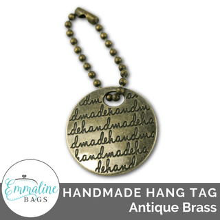 Metal Hanging Tag: Small Circle "handmade" in Antique Brass - Emmaline Bags Inc.