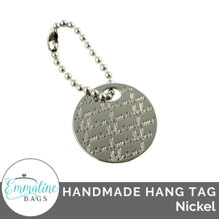 Metal Hanging Tag: Small Circle "handmade" in Nickel - Emmaline Bags Inc.