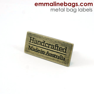 Metal Bag Label: "Handcrafted - Made in Australia" - Emmaline Bags Inc.