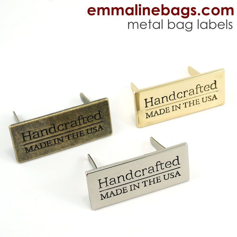 Metal Bag Label: "Handcrafted - Made in the USA" - Emmaline Bags Inc.