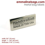 Metal Bag Label: "Handcrafted - Made in the USA" - Emmaline Bags Inc.