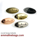 Metal Bag Label: Oval with "Handmade" - Emmaline Bags Inc.